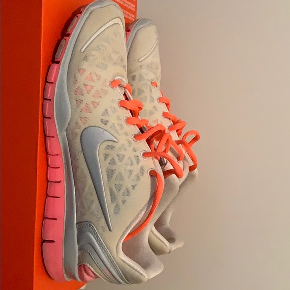 Nike Shoes - White and orange nike free size 8